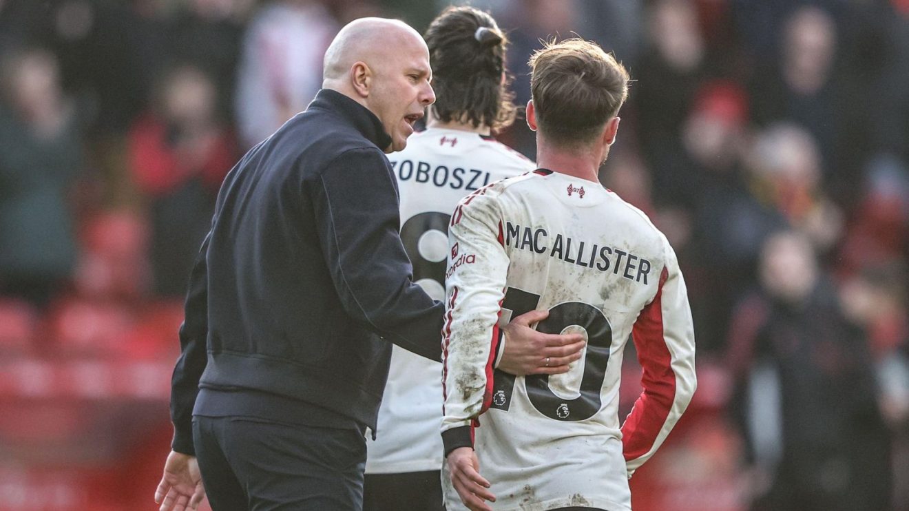 Arne Slot puts his arm around Alexis Mac Allister