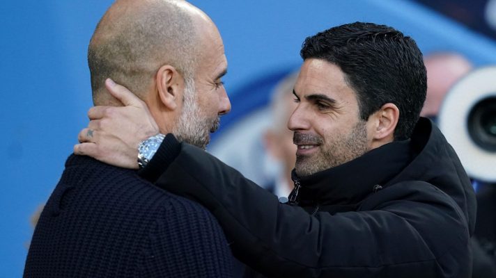 Arsenal manager Mikel Arteta and Pep Guardiola embrace each other