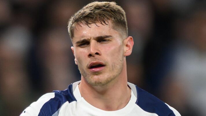 Spurs defender Micky van de Ven looks annoyed during a match