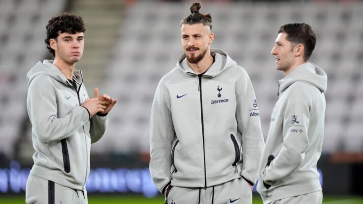 Spurs midfielder Archie Gray with Radu Dragusin and Ben Davies