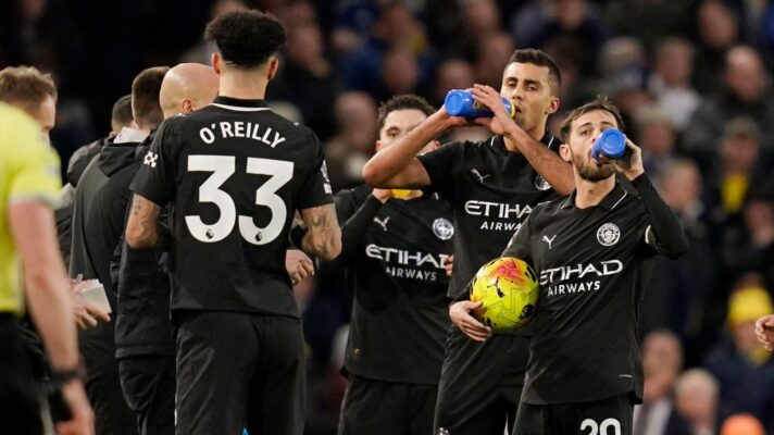 Man City players drink water during a pre-arranged Ramadan break