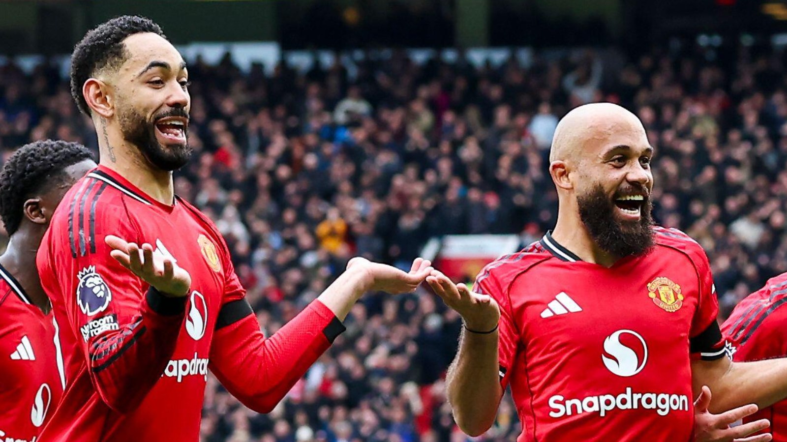 Manchester United players Matheus Cunha and Bryan Mbeumo celebrate