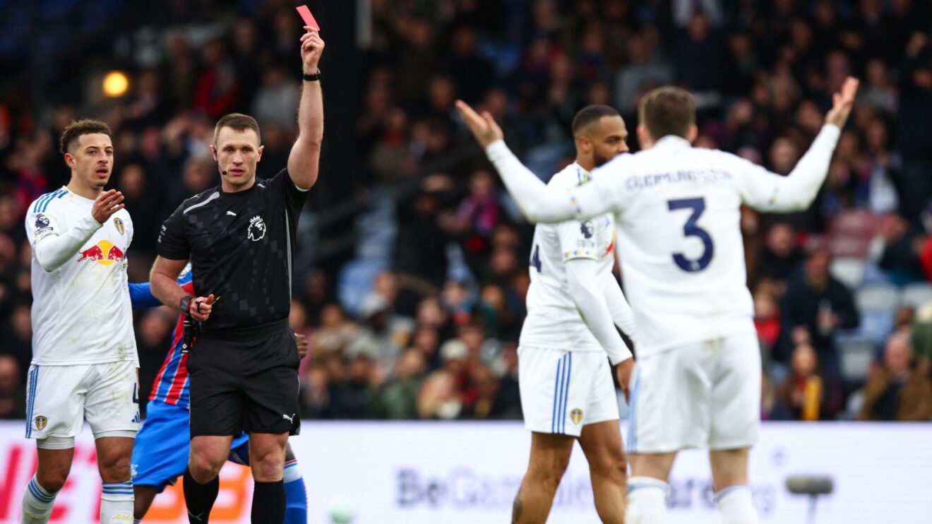 Referee Thomas Bramall shows Gabriel Gudmundsson of Leeds United a red card