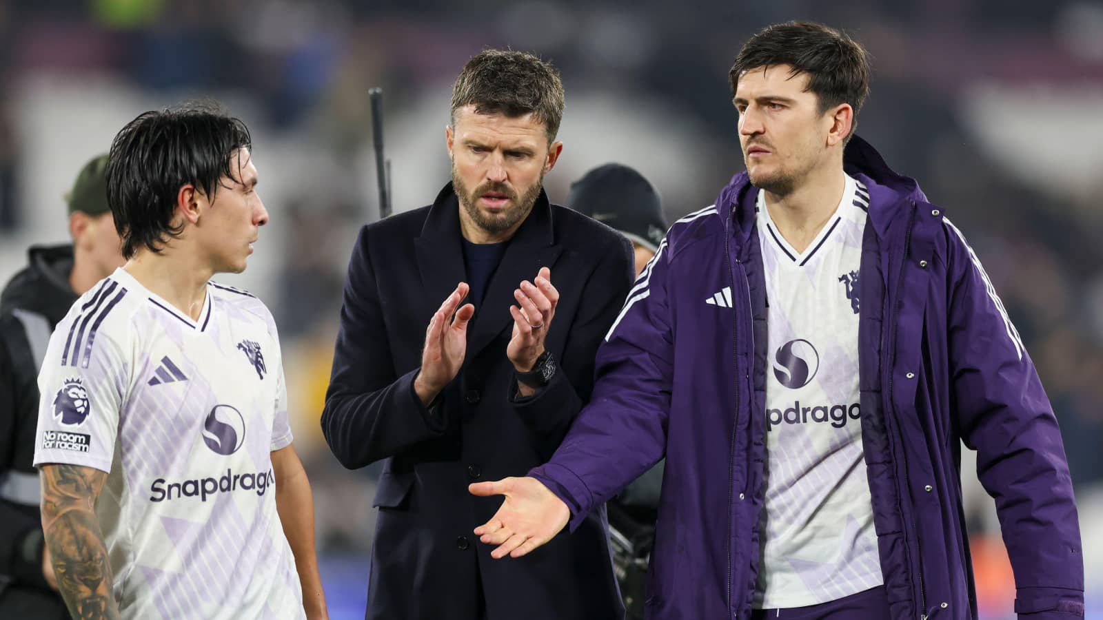 man utd manager michael carrick players lisandro martinez harry maguire