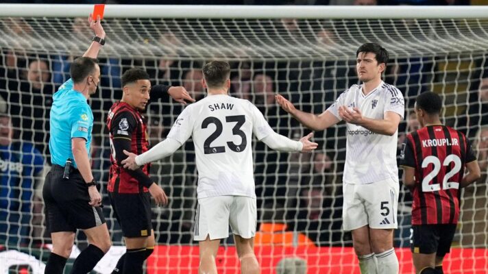 Man Utd defender Harry Maguire is shown a red card
