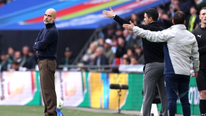 Pep Guardiola gives Mikel Arteta a look