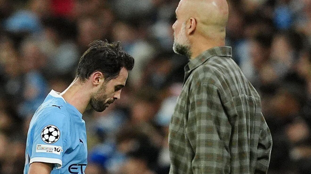 Manchester City player Bernardo Silva and manager Pep Guardiola