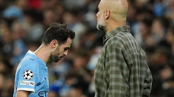 Manchester City player Bernardo Silva and manager Pep Guardiola