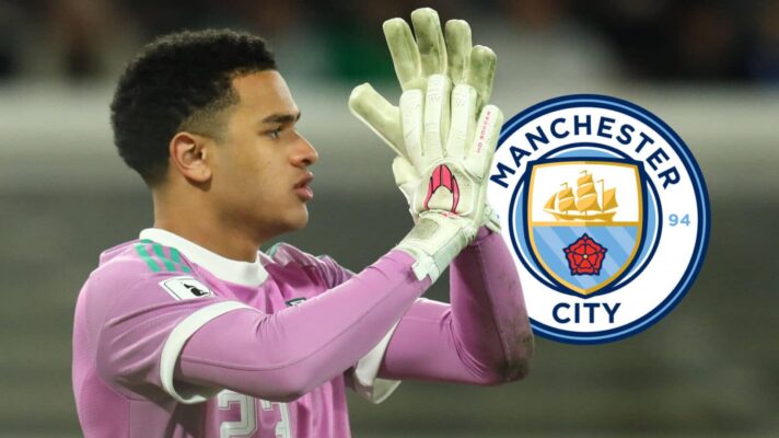 Pierce Charles with Man City badge