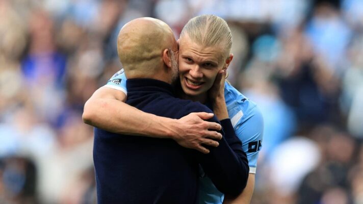 Erling Haaland hugs Pep Guardiola
