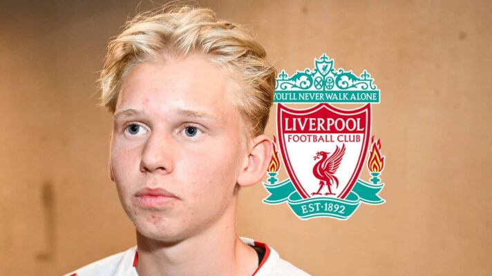 Fredrikstad FK midfielder Eirik Granaas next to the Liverpool badge - F365