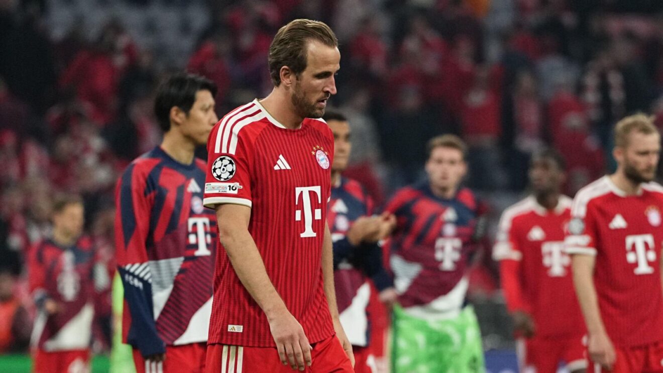 Harry Kane looks dejected after Bayern Munich crash out of the Champions League to PSG