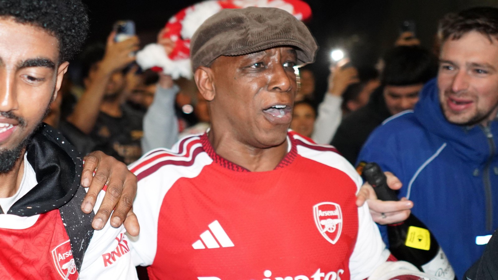 Former Arsenal player Ian Wright celebrates winning the title