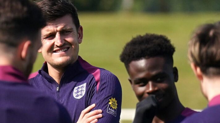 England players Harry Maguire and Bukayo Saka