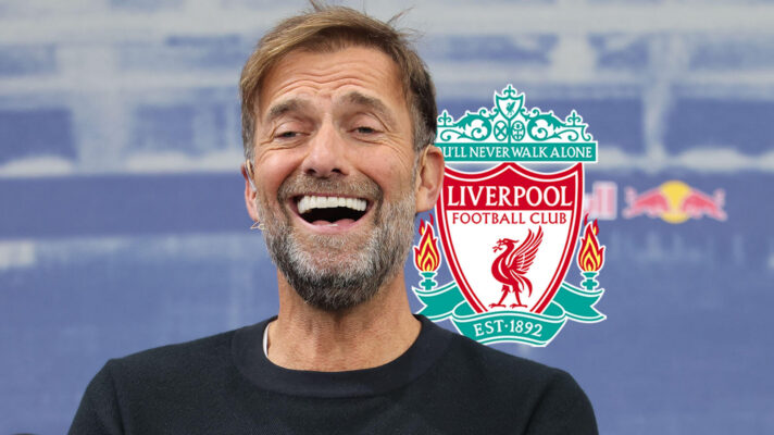 Jurgen Klopp with the Liverpool badge