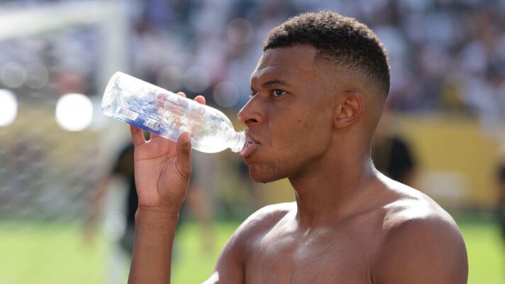 Kylian Mbappe with water bottle