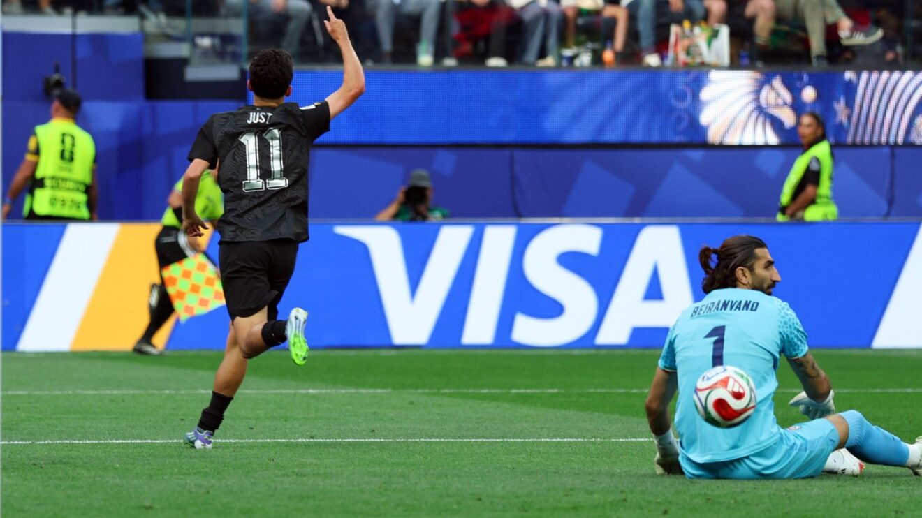 Elijah Just scores for New Zealand.