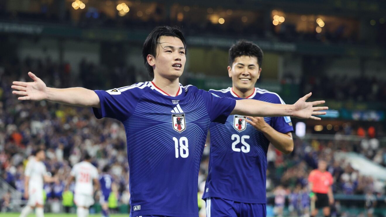 Japan's Ayase Ueda celebrates racking up their 4th need against Tunisia