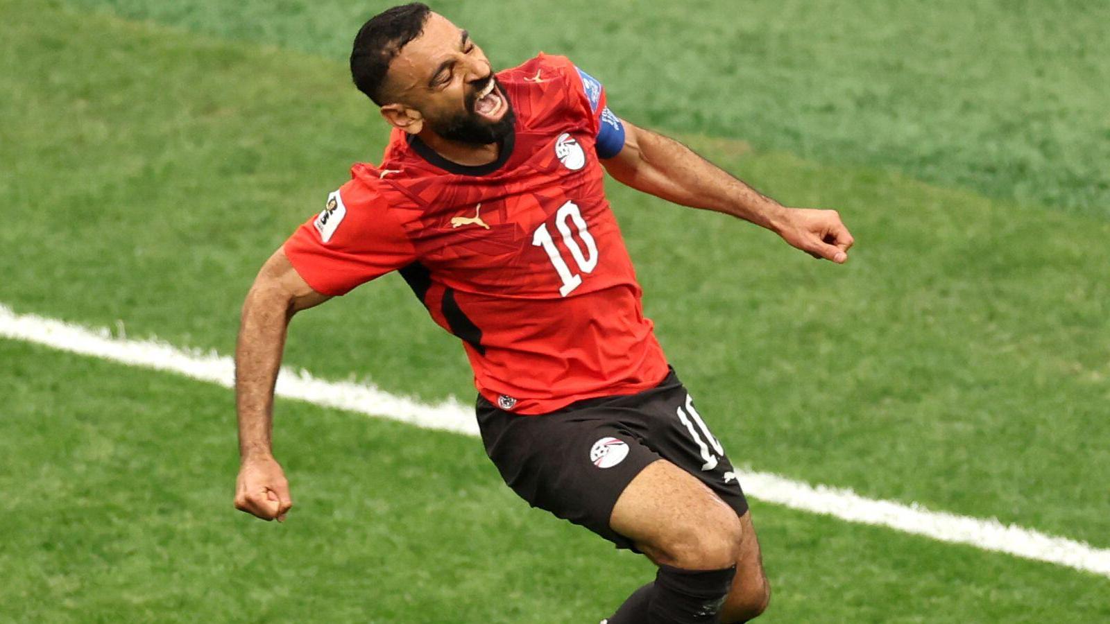 Salah demite Faraós para a primeira vitória na Copa do Mundo e lidera o Grupo G Salah demite Faraós para a primeira vitória na Copa do Mundo e lidera o Grupo G