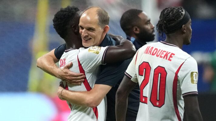 England boss Thomas Tuchel with Bukayo Saka and Noni Madueke