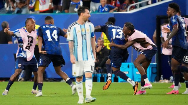 Sidny Cabral celebrates scoring for Cape Verdi while Lionel Messi reacts.
