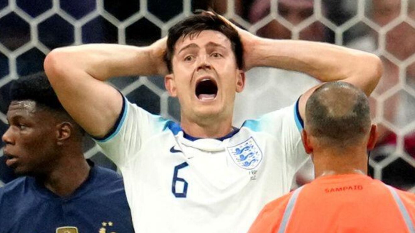 England defender Harry Maguire reacts against France at the World Cup