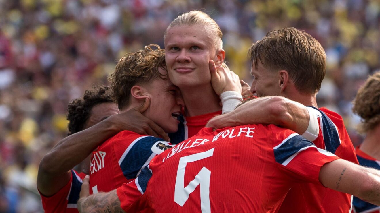 Erling Haaland is mobbed by Norway team-mates after scoring in a 2-1 World Cup win over Brazil