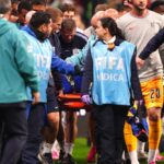 Jordan Henderson ‘in a bit of bother’ and stretchered off after fall over hoardings