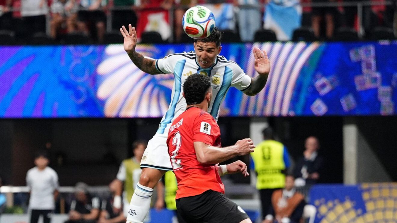 Argentina midfielder Enzo Fernandez heads in a goal