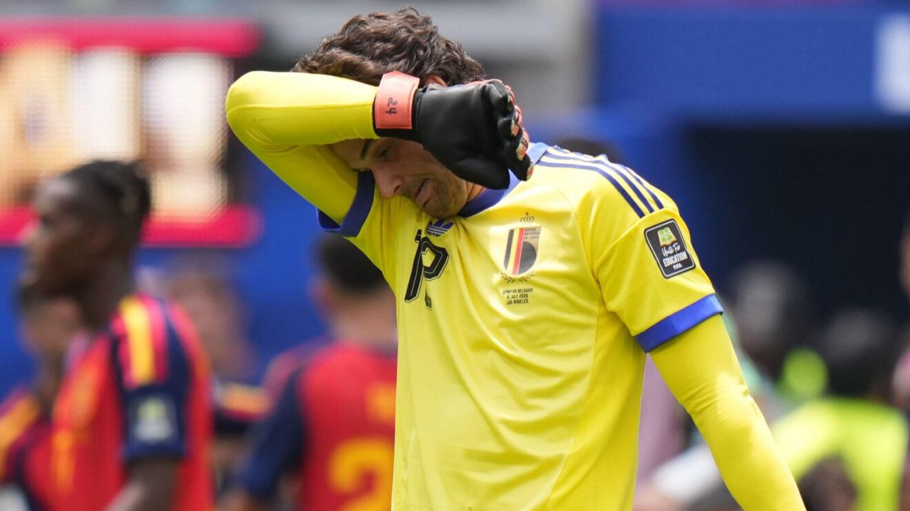 Senne Lammens dejected after an error playing for Belgium