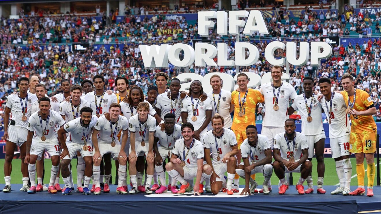 England players after receiving their bronze medals at the World Cup.
