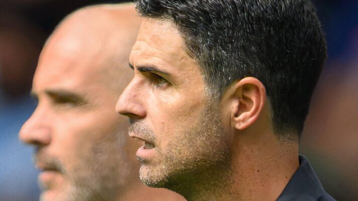 Arsenal manager Mikel Arteta with Manchester City coach Enzo Maresca in the background