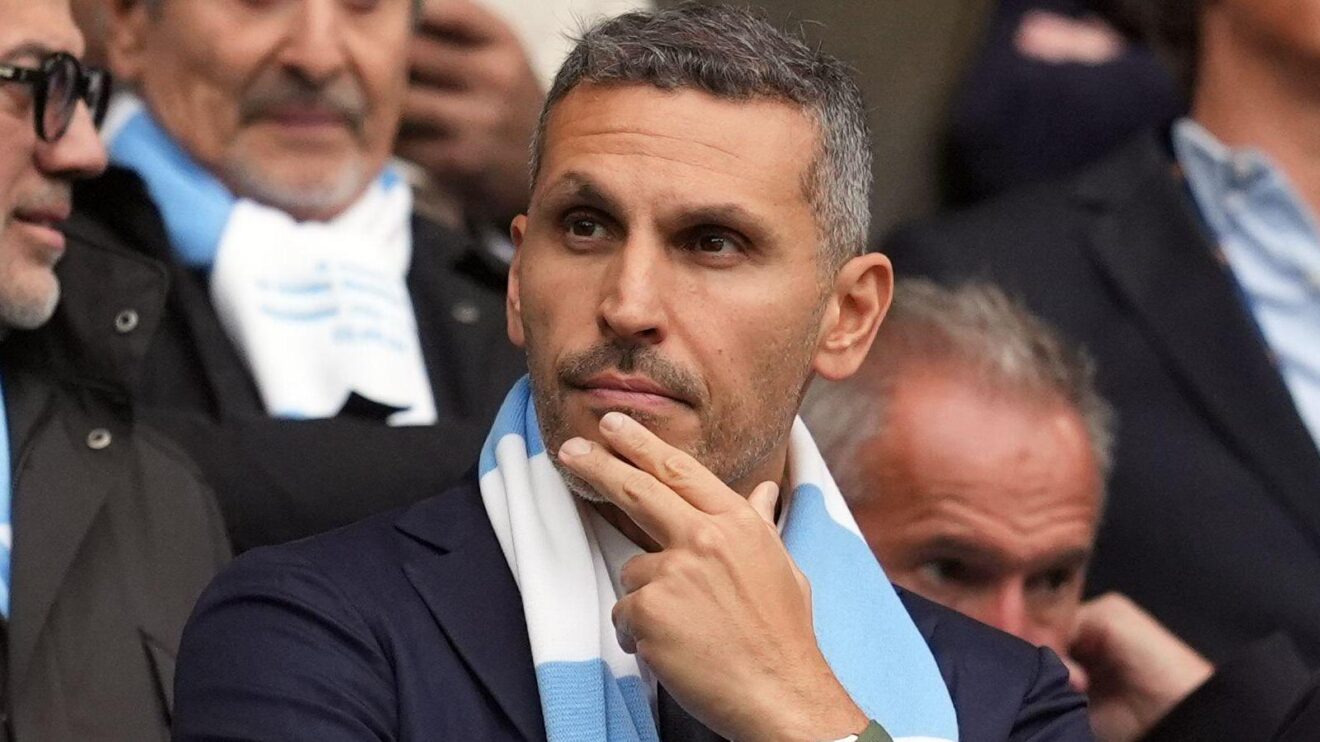 Khaldoon Al Mubarak looks on during a match