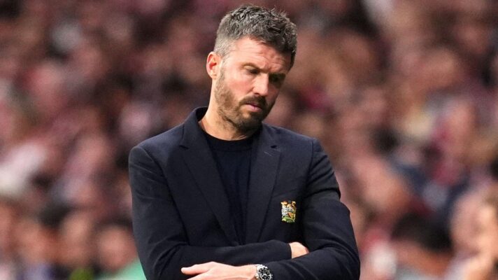Michael Carrick reacts after United fall behind.